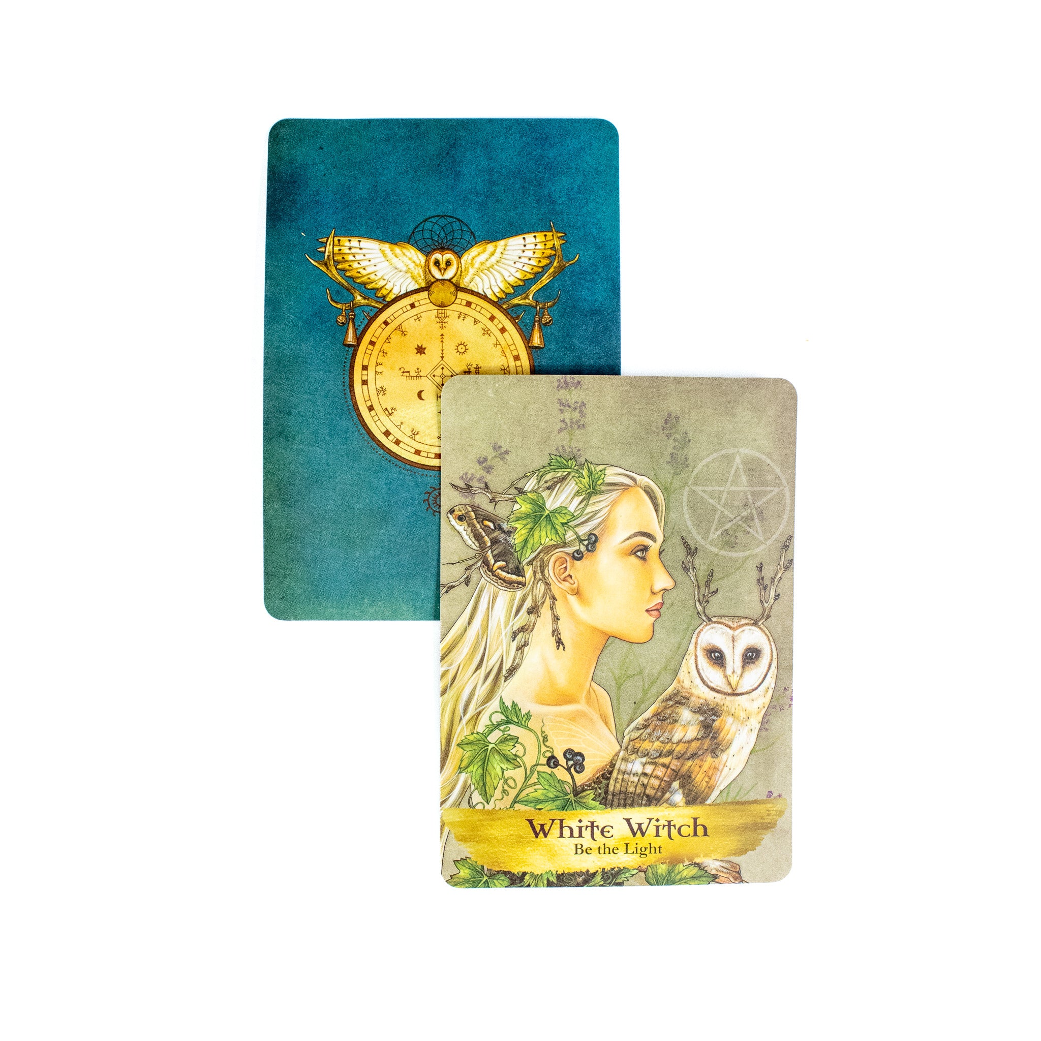 An example card from the deck. The White Witch card shows a woman holding an owl. She is covered in vines and has a moth in her hair. There is a pentagram in the background. The back of the card is also shown, it is teal with a circular image of astrological and occult symbols with an owl resting on it. 