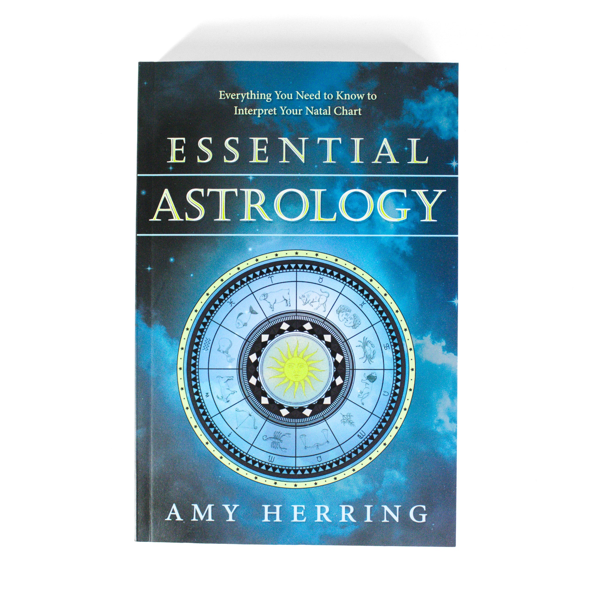 Cover of Essential Astrology by Amy Herring. Cover is a blue clouded night sky with a zodiac wheel at the center.