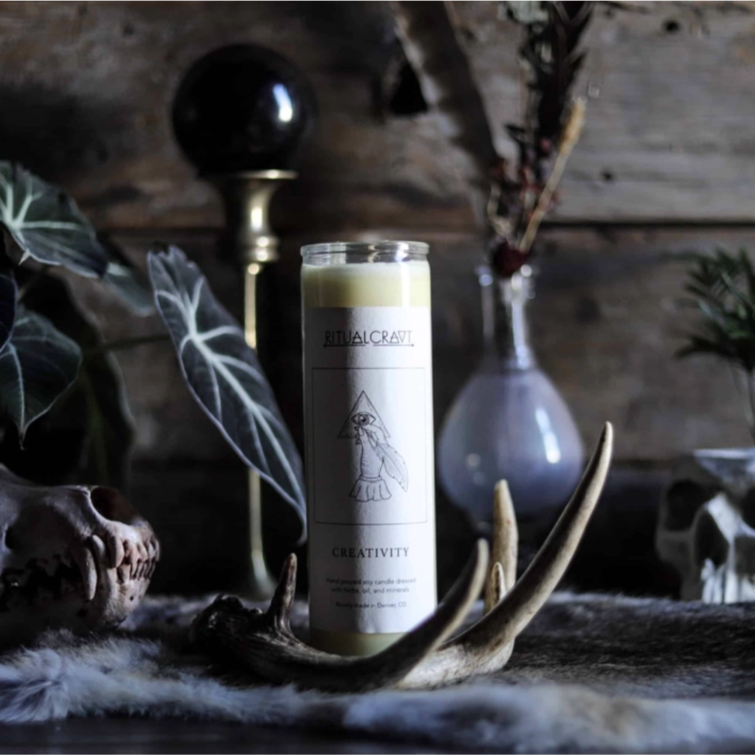 Creativity 7 day ritual jar candle, on a witchy background with antlers and plants. 